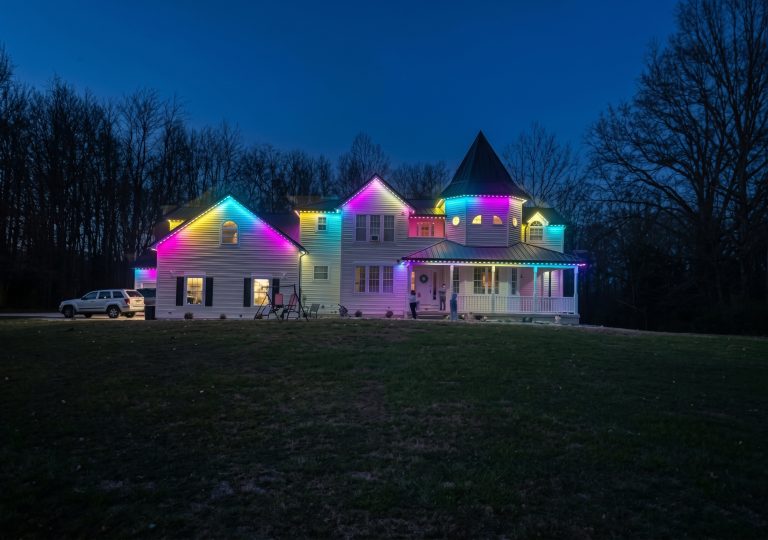 Roofline lit in rainbow party colors