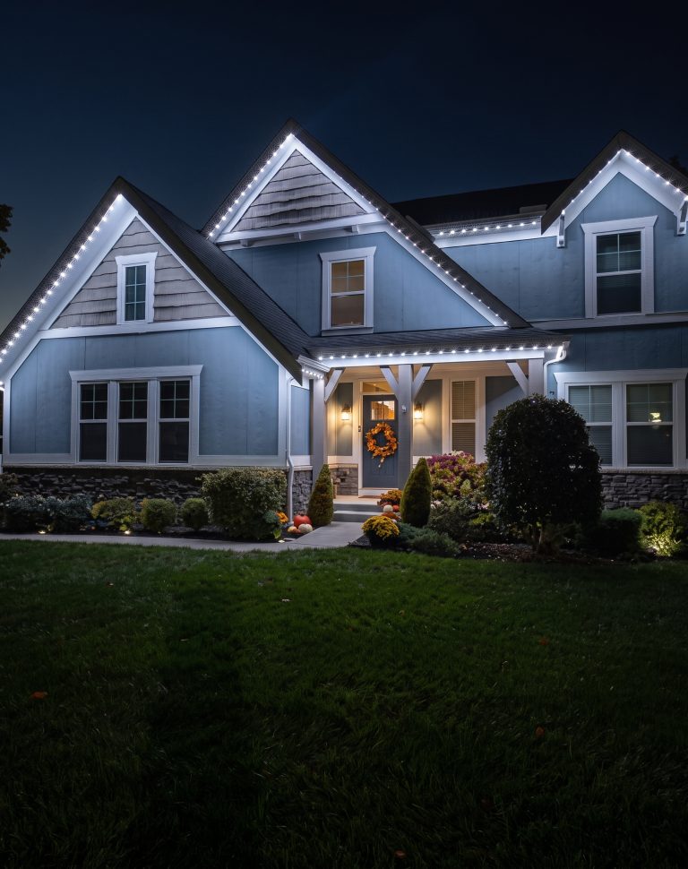 Bright white accent lighting along a roofline