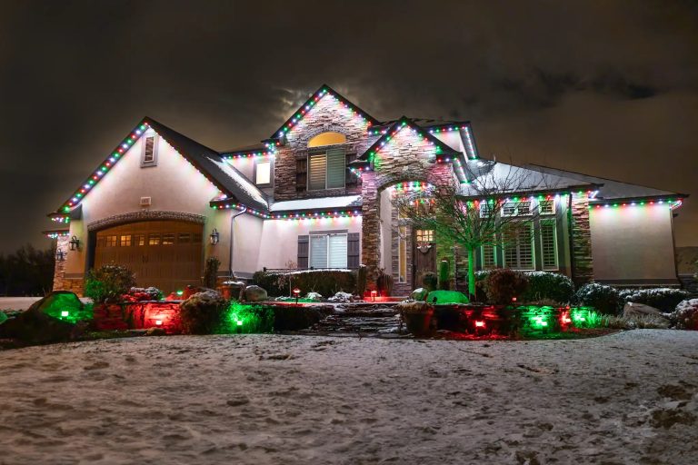 Home lit for Christmas with permanent roofline lights