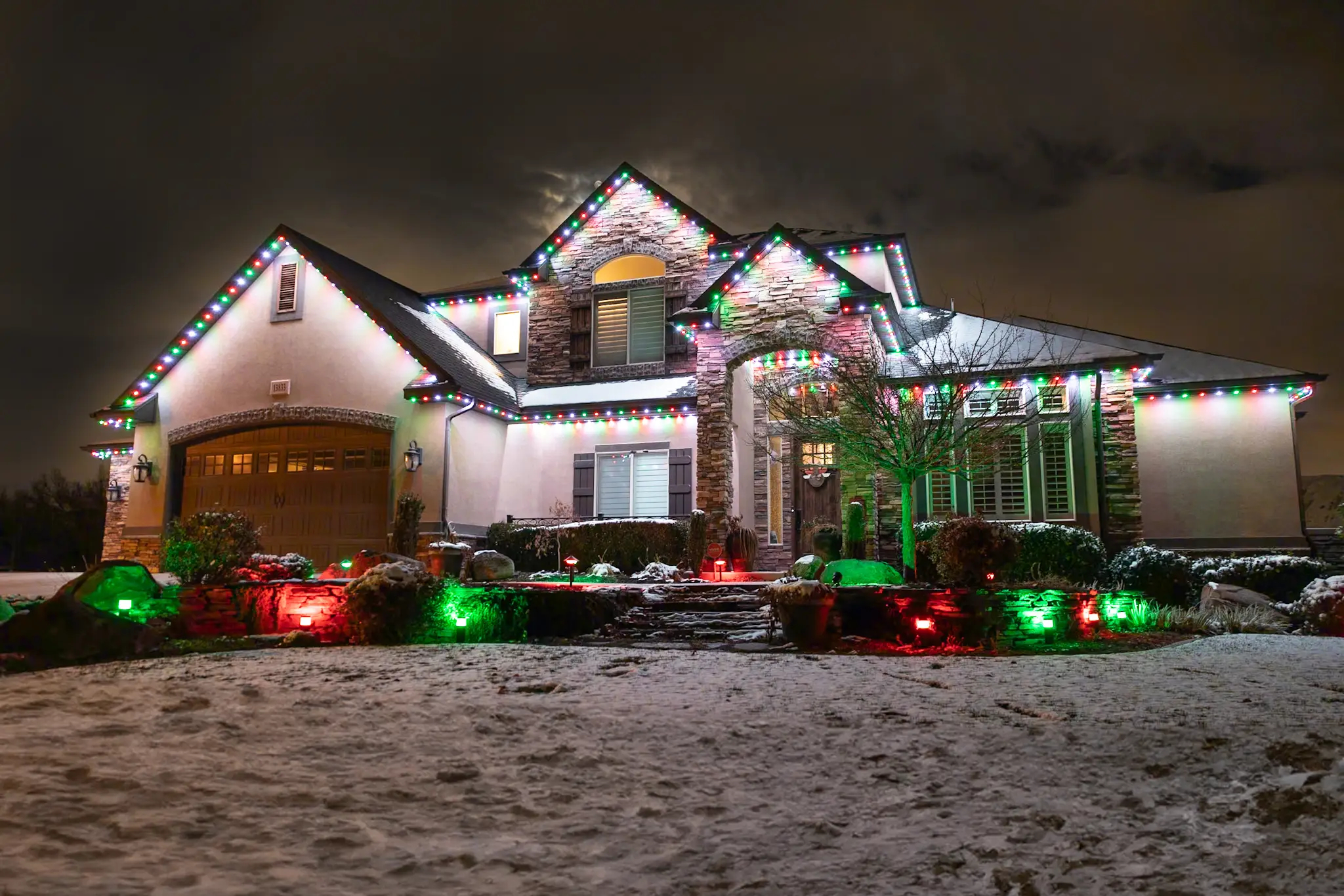 Home lit for Christmas with permanent roofline lights